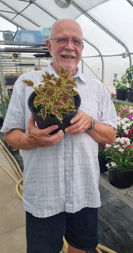 Rick Grazzini with Coleus Skeletal July 2024 (photo by Bruce Harnett)